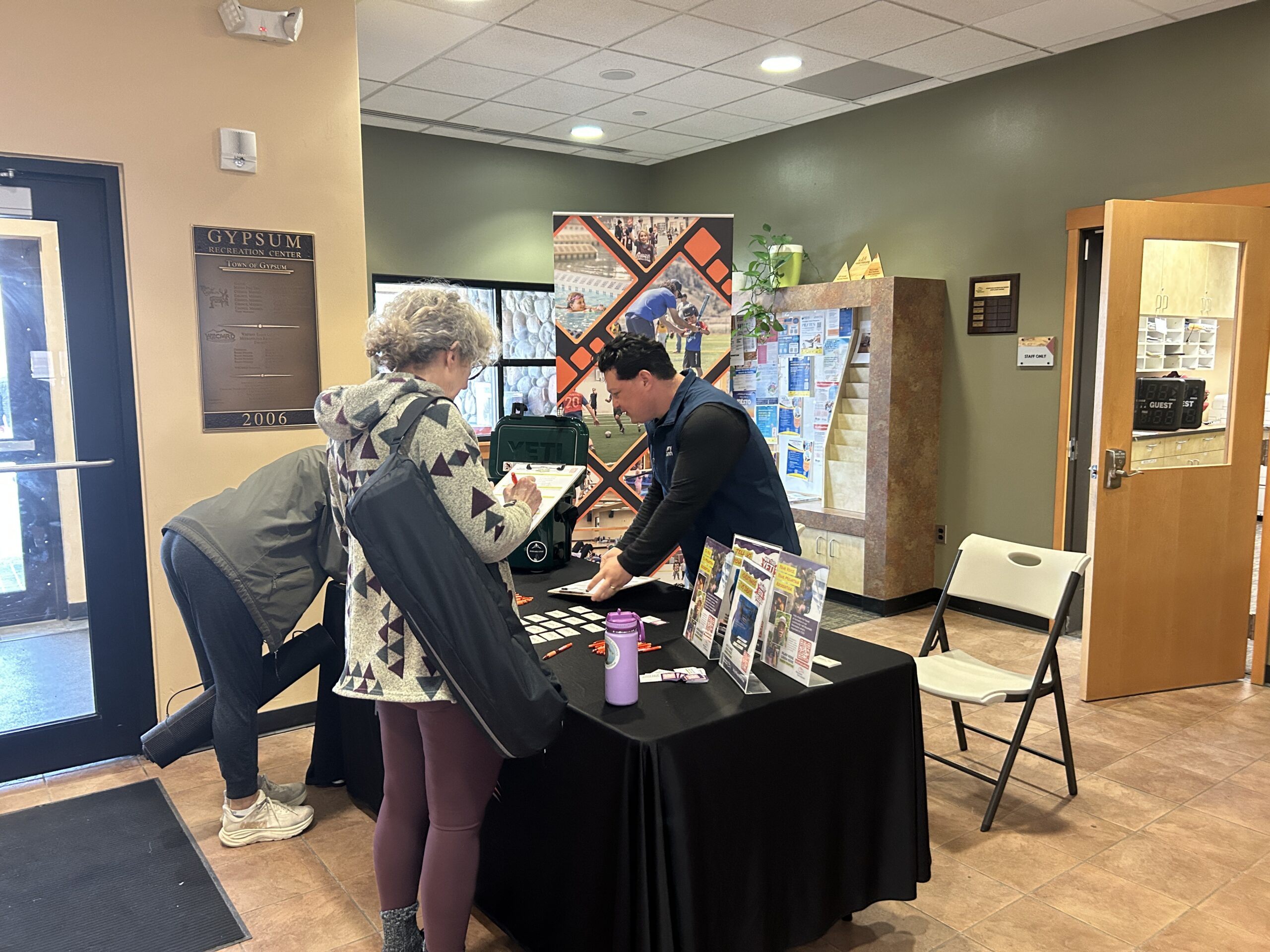People at a table talking about their ideas.