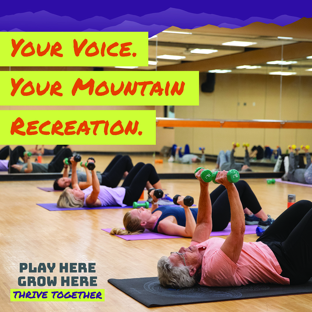 people doing yoga in a fitness studio