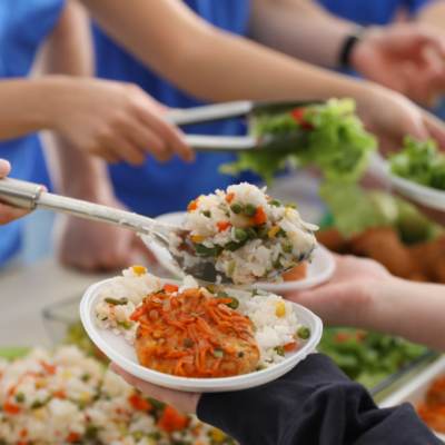 plates of food with hands